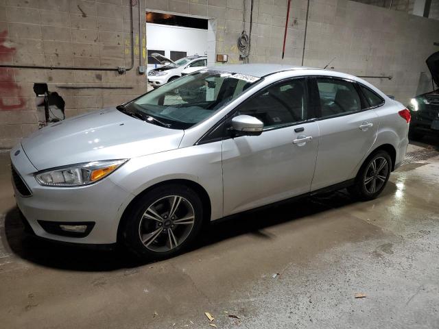 FORD FOCUS SE 2017 with VIN 1FADP3FE8HL299691 - Photo from auction