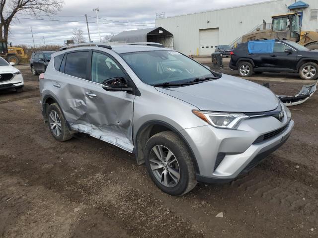 Photo 4 from auction – 2018 TOYOTA RAV4 LE with VIN 2T3ZFREV2JW520423