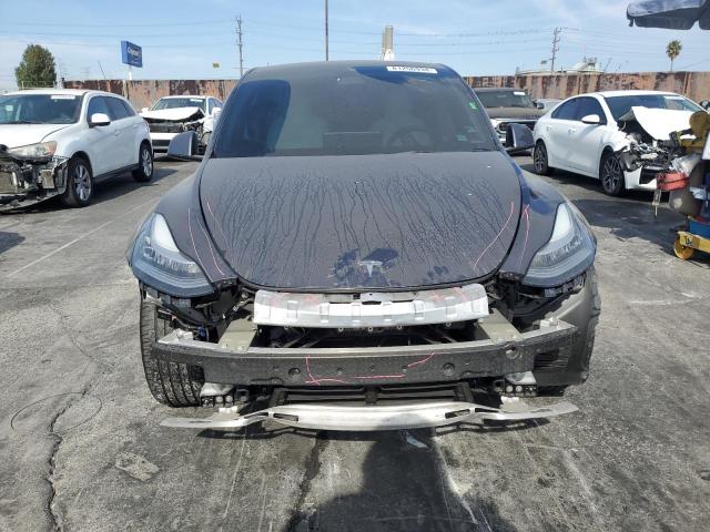 Photo 5 from auction – 2022 TESLA MODEL Y with VIN 7SAYGDEE0NF360021