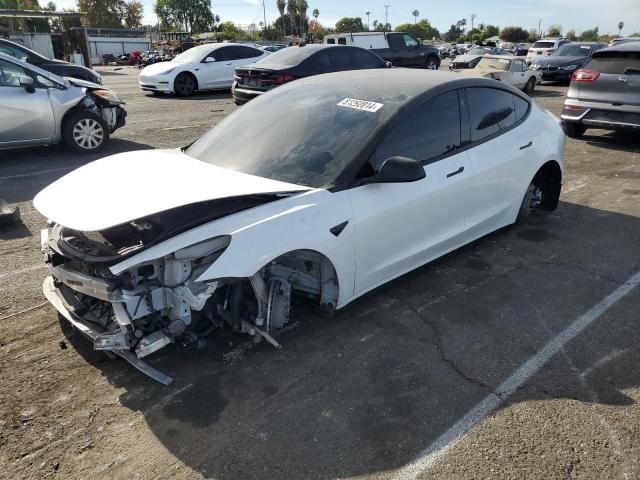 TESLA MODEL 3 2021 with VIN 5YJ3E1EB3MF047934 - Photo from auction