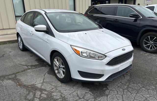 FORD FOCUS SE 2018 with VIN 1FADP3F27JL218305 - Photo from auction