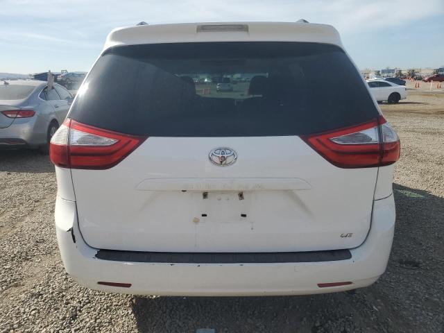 Photo 6 from auction – 2015 TOYOTA SIENNA LE with VIN 5TDKK3DC3FS640198