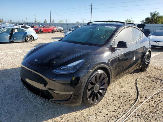 TESLA MODEL Y 2022 with VIN 7SAYGDEFXNF375487 - Photo from auction