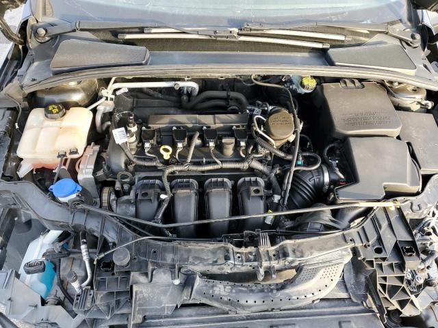 Photo 11 from auction – 2015 FORD FOCUS S with VIN 1FADP3E27FL356306