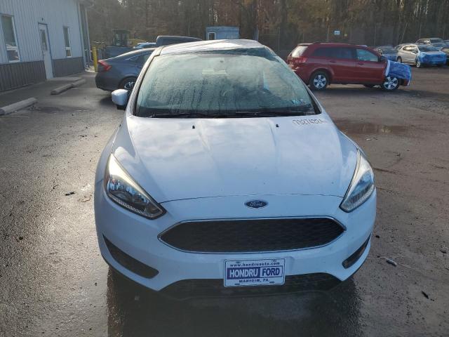 Photo 5 from auction – 2016 FORD FOCUS SE with VIN 1FADP3F23GL393126