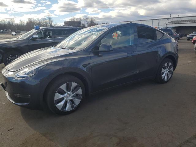 TESLA MODEL Y 2024 with VIN 7SAYGDEE8RF986406 - Photo from auction