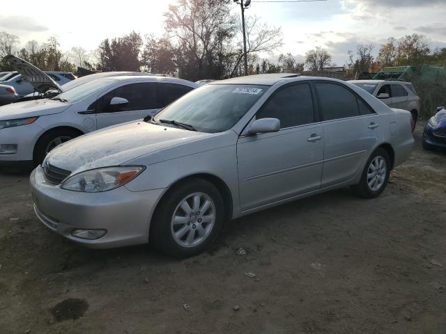 TOYOTA CAMRY LE 2003 with VIN 4T1BE30K03U686711 - Photo from auction