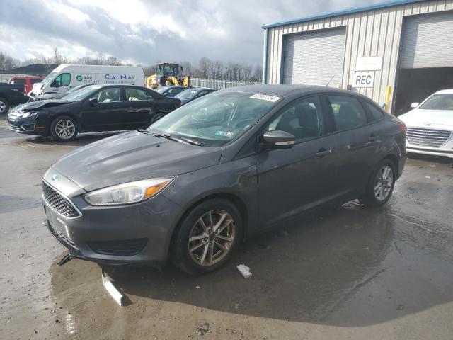 FORD FOCUS SE 2016 with VIN 1FADP3F21GL211973 - Photo from auction