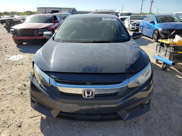 Photo 5 from auction – 2017 HONDA CIVIC TOUR with VIN 19XFC1F98HE007486