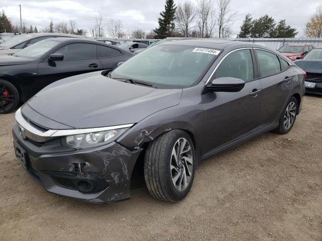 Photo 1 from auction – 2018 HONDA CIVIC EX with VIN 2HGFC2F86JH004210