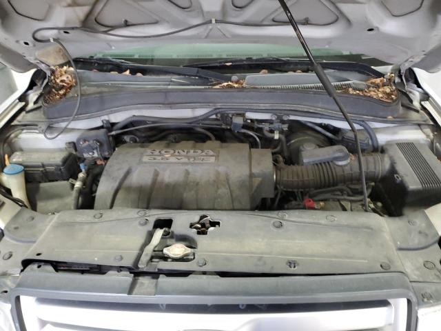Photo 12 from auction – 2006 HONDA PILOT EX with VIN 5FNYF185X6B013548