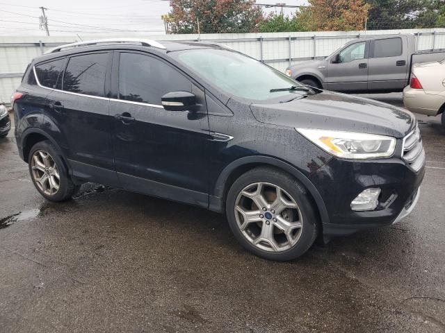 Photo 4 from auction – 2017 FORD ESCAPE TIT with VIN 1FMCU9J93HUD48328