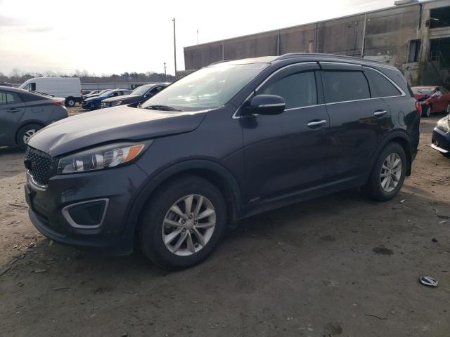 KIA SORENTO LX 2016 with VIN 5XYPGDA39GG022464 - Photo from auction