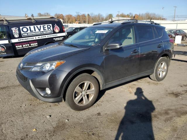TOYOTA RAV4 XLE 2014 with VIN JTMRFREV2ED063843 - Photo from auction