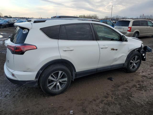 Photo 3 from auction – 2017 TOYOTA RAV4 XLE with VIN JTMRFREV1HJ707645