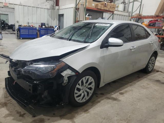 TOYOTA COROLLA L 2019 with VIN 5YFBURHE6KP883189 - Photo from auction