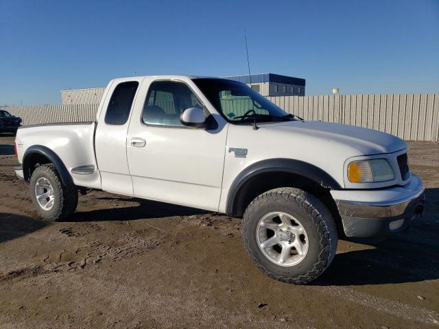 Photo 4 from auction – 2000 FORD F150 with VIN 1FTRX08L7YKA72511