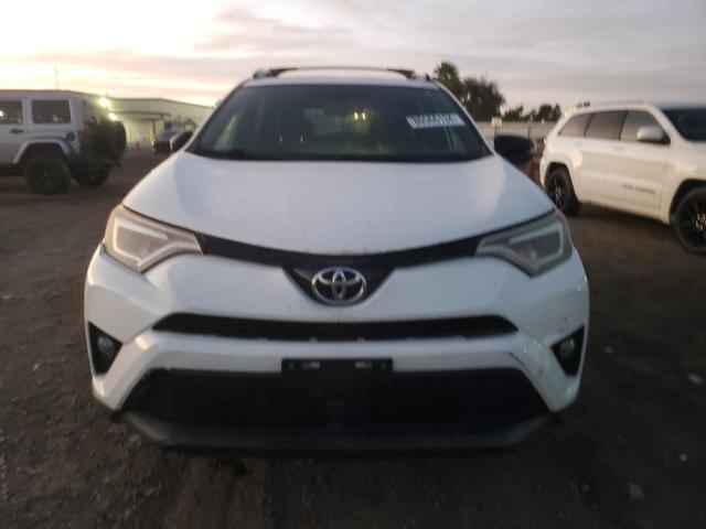 Photo 5 from auction – 2016 TOYOTA RAV4 SE with VIN JTMNFREV9GJ073112
