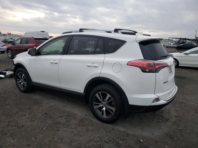Photo 2 from auction – 2017 TOYOTA RAV4 XLE with VIN JTMWFREV2HD102812