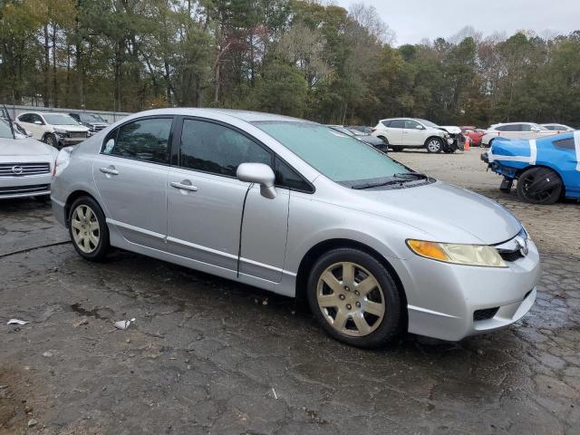 Photo 4 from auction – 2011 HONDA CIVIC LX with VIN 19XFA1F59BE035548