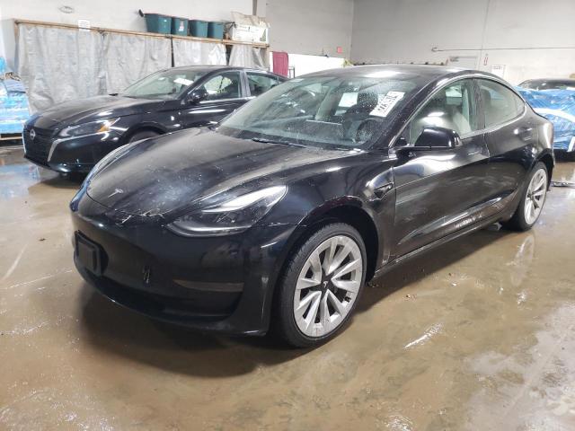 TESLA MODEL 3 2022 with VIN 5YJ3E1EA1NF303867 - Photo from auction