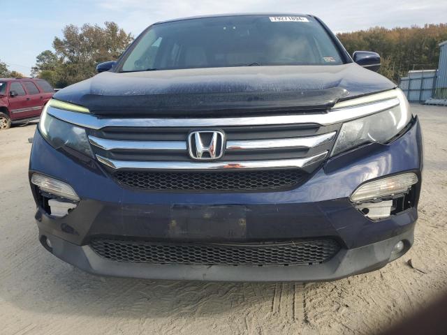 Photo 5 from auction – 2016 HONDA PILOT EXL with VIN 5FNYF6H57GB128493