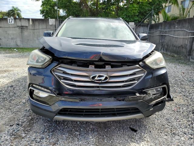 Photo 5 from auction – 2017 HYUNDAI SANTA FE S with VIN 5NMZU3LB9HH015926