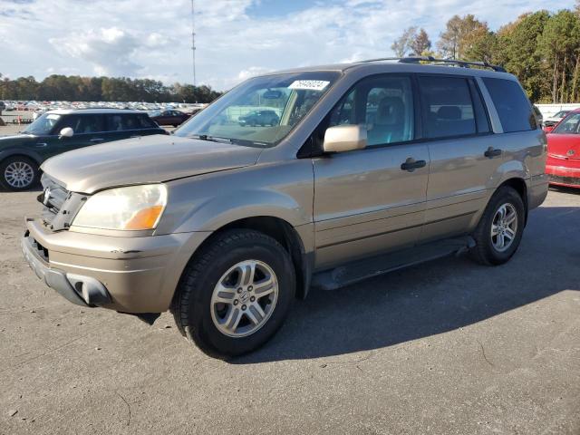 HONDA PILOT EXL 2004 with VIN 2HKYF18504H611243 - Photo from auction