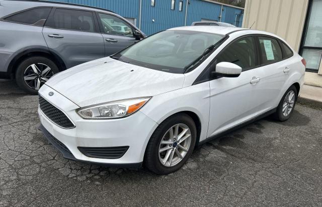 Photo 2 from auction – 2018 FORD FOCUS SE with VIN 1FADP3F27JL218305