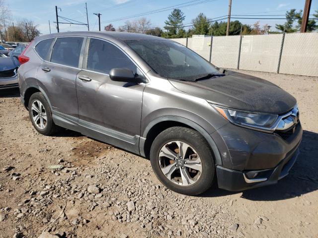 Photo 4 from auction – 2017 HONDA CR-V LX with VIN 7FARW5H39HE014112
