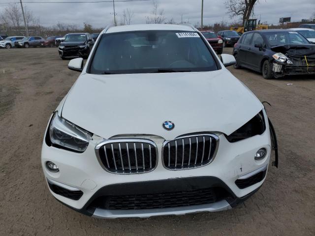 Photo 5 from auction – 2016 BMW X1 XDRIVE2 with VIN WBXHT3C36G5E47551