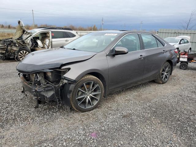 TOYOTA CAMRY LE 2016 with VIN 4T1BF1FK7GU603869 - Photo from auction