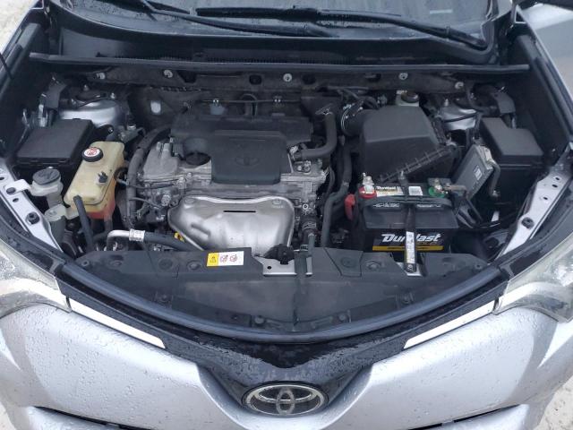 Photo 11 from auction – 2018 TOYOTA RAV4 LE with VIN JTMZFREV2JD111593