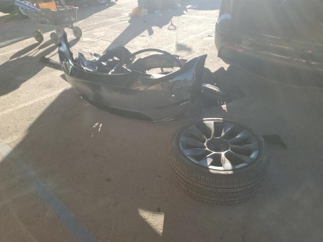Photo 13 from auction – 2022 TESLA MODEL Y with VIN 7SAYGDEEXNF550568