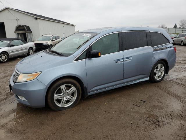 HONDA ODYSSEY TO 2011 with VIN 5FNRL5H95BB020425 - Photo from auction