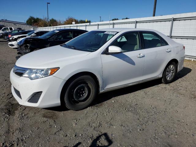 TOYOTA CAMRY L 2014 with VIN 4T4BF1FK8ER397934 - Photo from auction