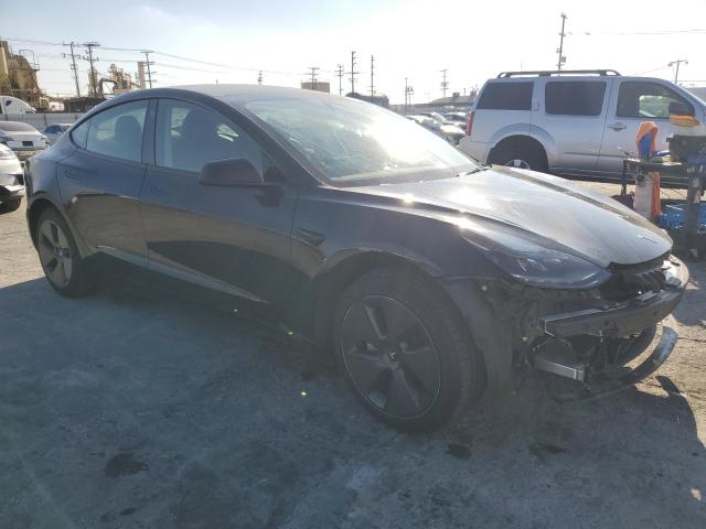 Photo 4 from auction – 2023 TESLA MODEL 3 with VIN 5YJ3E1EA0PF585308