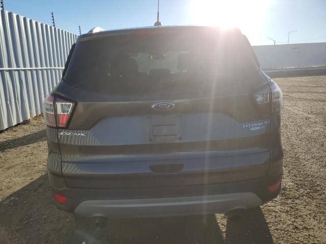 Photo 6 from auction – 2017 FORD ESCAPE TIT with VIN 1FMCU9J92HUE60313
