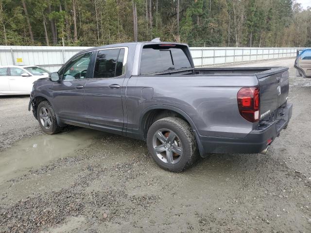 Photo 2 from auction – 2023 HONDA RIDGELINE with VIN 5FPYK3F54PB047391