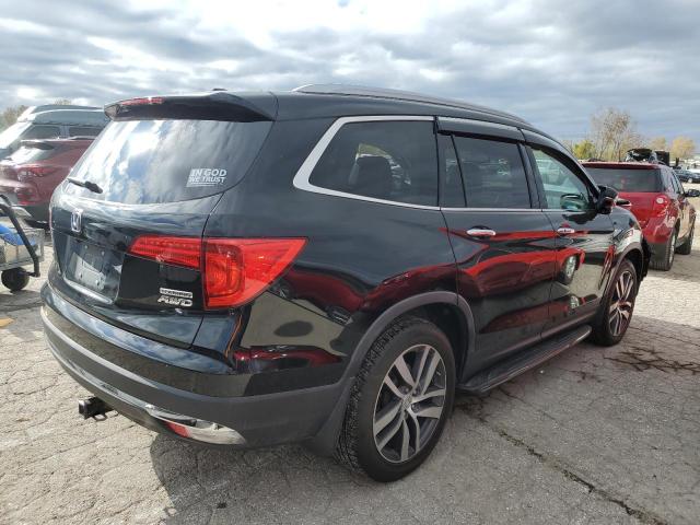 Photo 3 from auction – 2017 HONDA PILOT TOUR with VIN 5FNYF6H99HB010322