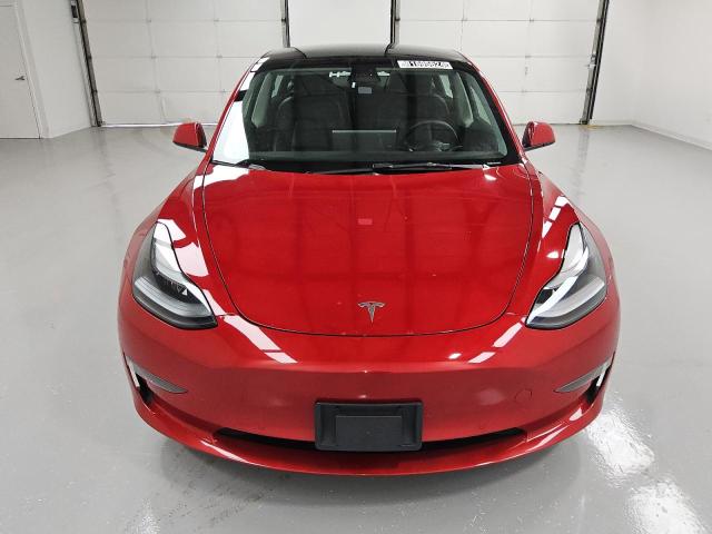 Снимка 5 от търг – 2022 TESLA MODEL 3 с VIN 5YJ3E1EAXNF370354