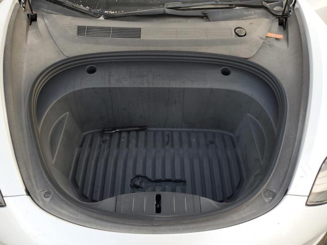 Photo 11 from auction – 2021 TESLA MODEL 3 with VIN 5YJ3E1EA8MF091001
