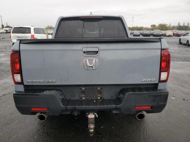 Photo 6 from auction – 2022 HONDA RIDGELINE with VIN 5FPYK3F58NB030655