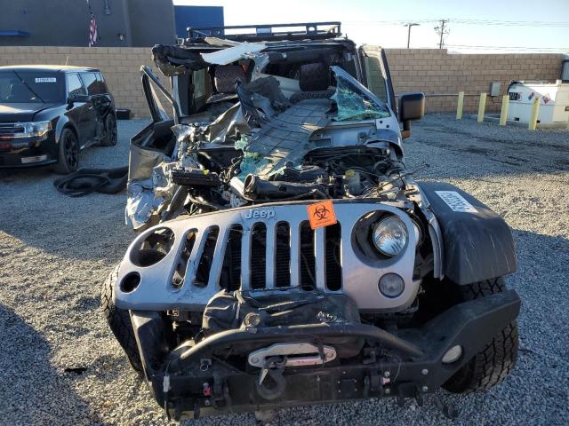 Photo 5 from auction – 2014 JEEP WRANGLER U with VIN 1C4BJWFG3EL166578