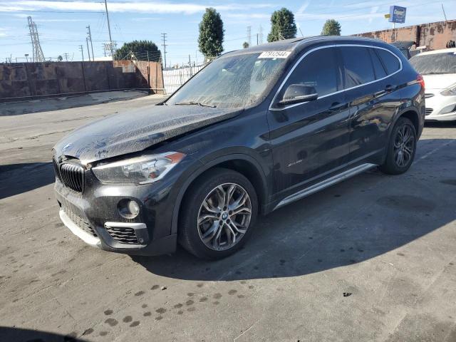 Photo 1 from auction – 2016 BMW X1 XDRIVE2 with VIN WBXHT3C35G5E56709