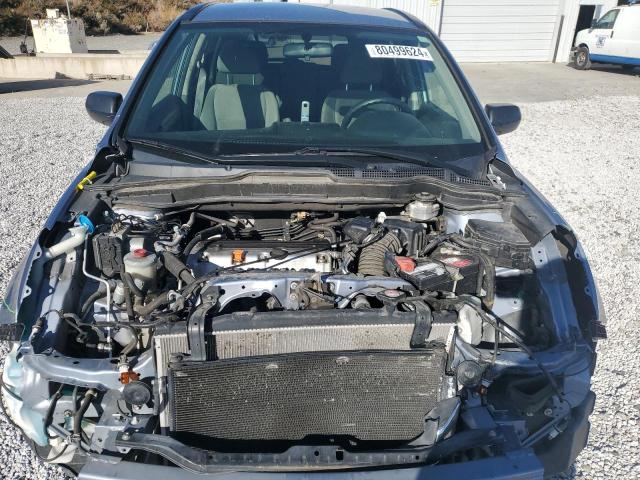 Photo 12 from auction – 2011 HONDA CR-V SE with VIN JHLRE4H43BC022957