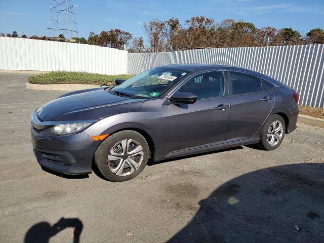HONDA CIVIC LX 2017 with VIN 19XFC2F52HE037151 - Photo from auction