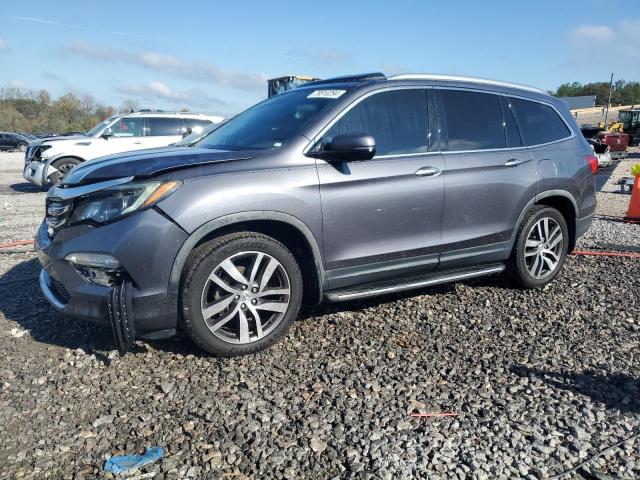 HONDA PILOT ELIT 2017 with VIN 5FNYF6H07HB059519 - Photo from auction