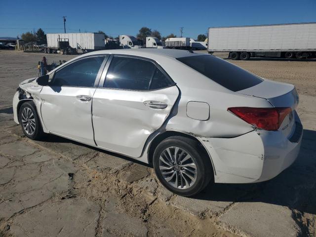Photo 2 from auction – 2017 TOYOTA COROLLA L with VIN 5YFBURHE4HP572711