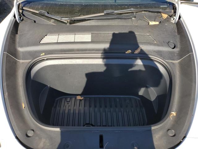 Photo 12 from auction – 2021 TESLA MODEL Y with VIN 5YJYGAEE1MF144429
